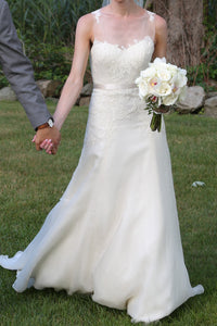 Christos 'Ophelia' size 4 used wedding dress front view on bride