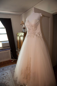 Oleg Cassini 'One Shoulder Tulle' size 12 used wedding dress front view on hanger