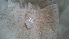 Load image into Gallery viewer, Oleg Cassini &#39;Strapless&#39; size 18 new wedding dress back view of dress
