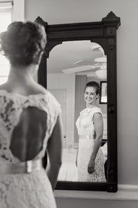 David Fielden '8058' size 6 used wedding dress back view on bride