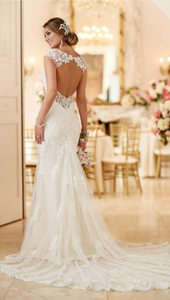 Stella York 'Romantic Lace' size 10 used wedding dress back view on model