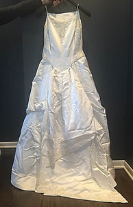 Vera Wang 'Custom Beaded' size 8 used wedding dress back view on hanger