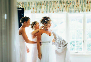 Stella York 'Flowing Sheath' size 10 used wedding dress side view on bride