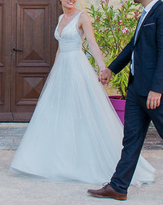 Angel Sanchez 'Something Blue' size 4 used wedding dress side view on bride