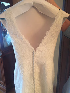 Paloma Blanca '4451' size 10 new wedding dress back view close up on hanger