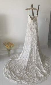 Yumi Katsura 'Camille size 8 sample wedding dress back view on hanger
