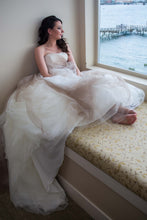 Load image into Gallery viewer, Vera Wang &#39;Strapless&#39; size 6 used wedding dress front view on bride
