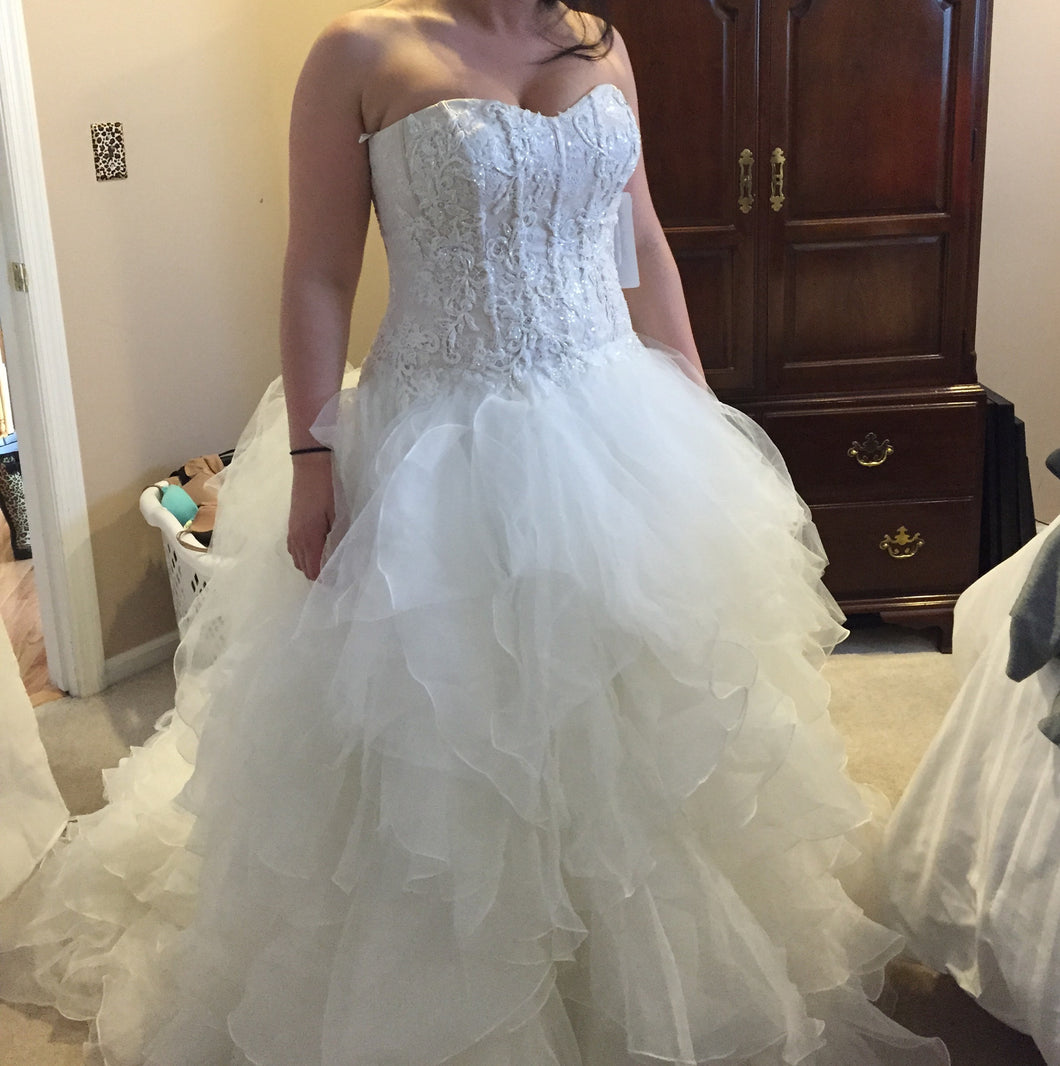 Oleg Cassini 'Organza Ruffle' size 8 used wedding dress front view on bride