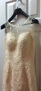 Custom Boutique 'Fit and Flare' size 2 used wedding dress front view on hanger
