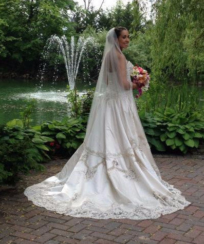 Amalia Carrara '104 cp-11' size 12 used wedding dress side view on bride