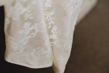 Load image into Gallery viewer, Nicole Miller &#39;Madison&#39; size 4 used wedding dress close up of material
