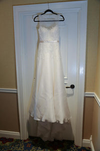 Christos 'Ophelia' size 4 used wedding dress front view on hanger