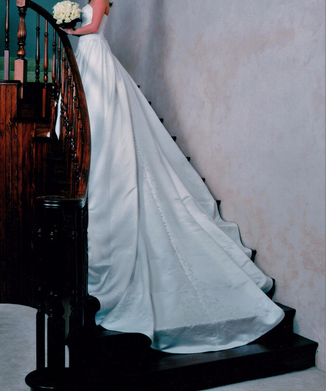 Audrey Hart 'Italian Satin' size 6 used wedding dress side view on bride