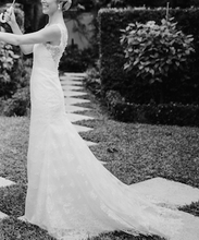 Load image into Gallery viewer, Carolina Herrera &#39;Daisy&#39; size 2 used wedding dress side view on model
