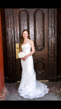 Load image into Gallery viewer, Private Collection &#39;Fit and Flare&#39; size 4 used wedding dress front view on bride
