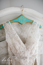 Load image into Gallery viewer, Monique Lhuillier &#39;Aurora&#39; size 8 used wedding dress front view of bodice on hanger
