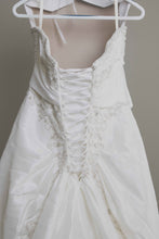 Load image into Gallery viewer, Custom &#39;Meagan Schlottmann&#39;  size 16 used wedding dress back view close up  on hanger
