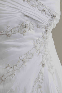 Custom 'Meagan Schlottmann'  size 16 used wedding dress close up of fabric