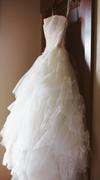 Vera Wang 'Eliza' size 4 used wedding dress side view on hanger