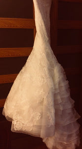 Vera Wang 'Leda' size 2 used wedding dress side view on hanger