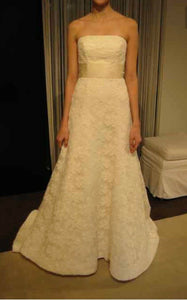 Vera Wang 'Ivory Lace Strapless A-Line' size 4 used wedding dress front view on bride