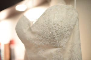 Custom Boutique 'Randi' size 16 used wedding dress close up of bust line