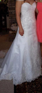 Maggie Sottero 'Straplesss' size 6 used wedding dress front view on bride