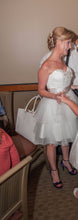 Load image into Gallery viewer, MTA Solano &#39;Ivory Elegance&#39; size 4 used wedding dress front view on bride
