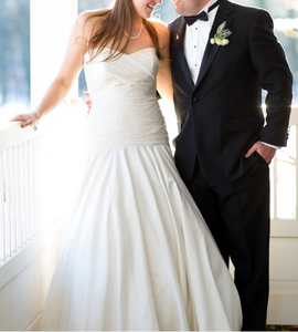 Romona Keveza 'Legends' size 8 used wedding dress front view on bride