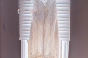 Amy Kuschel 'Monroe' size 0 new wedding dress front view on hanger