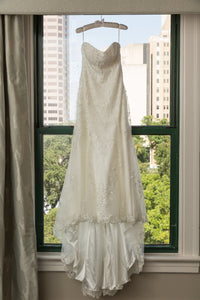 Maggie Sottero 'Amaya' size 14 used wedding dress front view on hanger
