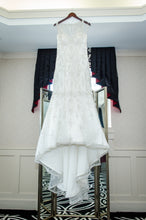 Load image into Gallery viewer, Maggie Sottero &#39;Blakely&#39; size 10 used wedding dress front view on hanger

