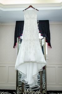 Maggie Sottero 'Blakely' size 10 used wedding dress front view on hanger