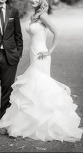 Load image into Gallery viewer, Pronovias &#39;Ledurne&#39; size 2 used wedding dress side view on bride
