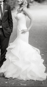 Pronovias 'Ledurne' size 2 used wedding dress side view on bride