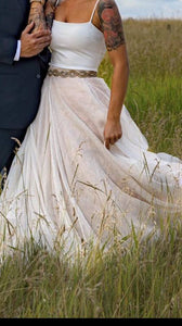 Carol Hannah 'Kensington' size 2 used wedding dress front view on bride