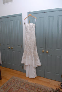 Oleg Cassini 'Mikado Fit and Flare' size 6 used wedding dress front view on hanger
