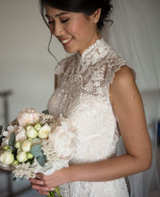 Load image into Gallery viewer, Custom  &#39;Full Corded Lace Mermaid&#39; size 4 used wedding dress side view close up on bride
