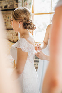 Augusta Jones 'Skylar' size 4 used wedding dress side view on bride