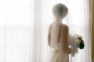 Jim Hjelm 'Laila' size 4 used wedding dress back view on bride