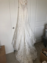 Load image into Gallery viewer, Maggie Sottero &#39;Cadence&#39; size 6 used wedding dress back view on hanger
