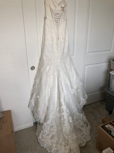 Maggie Sottero 'Cadence' size 6 used wedding dress back view on hanger