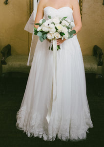 Robert Bullock 'Galina' size 10 used wedding dress front view on bride