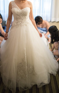 Oleg Cassini 'One Shoulder Tulle' size 2 used wedding dress front view on bride