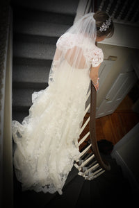 Casablanca '2102' size 4 used wedding dress back view on bride