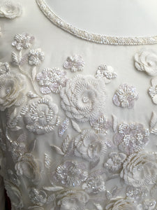 Carolina Herrera 'Long Sleeved' size 4 used wedding dress close up on bodice