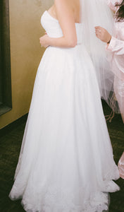 Robert Bullock 'Galina' size 10 used wedding dress side view on bride