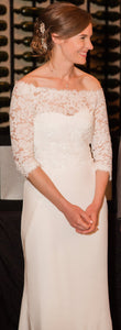Amy Kuschel 'Halston' size 4 used wedding dress front view on bride