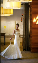 Load image into Gallery viewer, Allure Bridals &#39;9000&#39; size 6 used wedding dress front view on model
