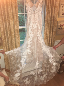 BHLDN 'Milano' size 8 used wedding dress back view on hanger